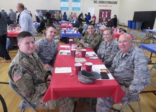 Benjamin Harrison YMCA Honors Veterans sitting at table