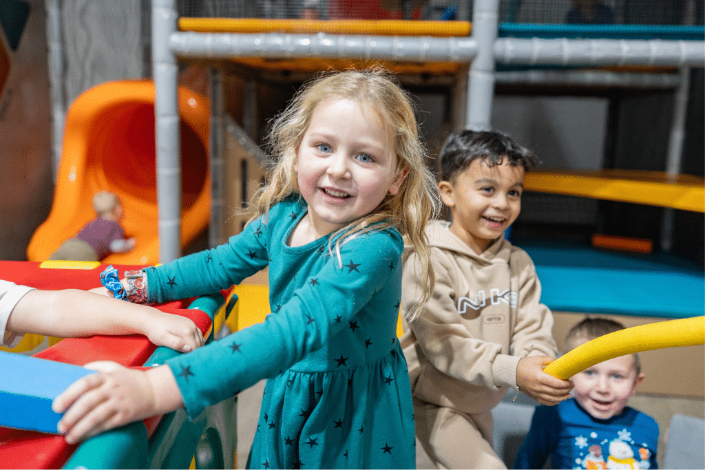 Kids play on the indoor playground at the YMCA.